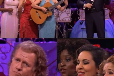 André Rieu’s live performance of Manhã de Carnaval in São Paulo offers a stunning blend of passion, emotion, and musical craftsmanship. Joined by Carla Maffioletti, Carmen Monarcha, and Kimmy Skota, Rieu transforms Luiz Bonfá’s classic Brazilian tune into a rich, orchestral experience that moves beyond its bossa nova roots. The Johann Strauss Orchestra’s sweeping strings bring a sense of grandeur to the piece, while the vocalists’ performances add layers of warmth, sensuality, and tenderness. Maffioletti’s lush voice, Monarcha’s operatic richness, and Skota’s bright, captivating presence complement one another, creating a performance that exudes both beauty and nostalgia. This live rendition not only celebrates the heart of Brazilian music but also showcases Rieu’s remarkable ability to bridge cultural worlds through the universal language of music.