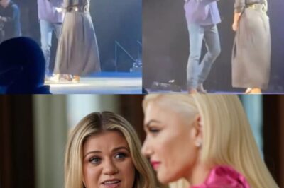 “Sorry Gwen, But I’m Not Going To Stop!” Kelly Clarkson Once Again Crossed The Line With Gwen Stefani As She Shared Yet Another Intimate Performance With Blake Shelton! Making A Surprise Appearance On Stage At Ball Arena In Denver, Colorado, While Blake Was Interacting With Fans During His “Friends & Heroes Tour”, Kelly Clarkson Shocked Everyone—Including Blake Himself—By Rushing Out And Embracing Him. The Two Then Captivated The Entire Audience With A Romantic, Seamlessly Harmonized Duet Of “Lonely Tonight,” Leaving Not Only The Crowd Speechless, But Reportedly Even Gwen Herself At A Loss For Words After Witnessing Their Stunning Chemistry On Stage!