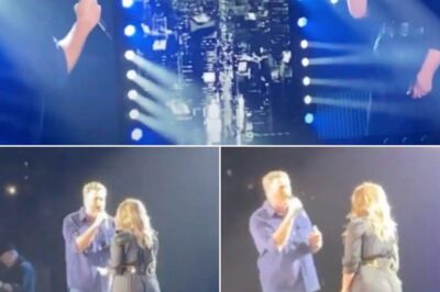 The Crowd Was Stunned As Blake Shelton Halted His Performance With A Playful Tease: “I Think We Need Someone Special For This One.” Moments Later, Kelly Clarkson Gracefully Took The Stage, Instantly Transforming The Atmosphere.Their Surprise Duet Of “Lonely Tonight” Was Nothing Short Of Spellbinding—Their Voices Intertwining In A Raw, Electric Harmony That Felt Like An Intimate, Unspoken Truth. Every Note Was Charged With Emotion, Striking A Deep Chord With The Audience. By The Final Note, The Entire Room Erupted In A Standing Ovation, Captivated By The Sheer Magic Of The Moment.