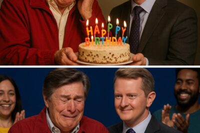 CAN’T HOLD BACK THE TEARS: THE JEWELRY PIECE of Jeopardy! – Johnny Gilbert turns 97, and what Ken Jennings does next brings the studio to a standstill. It was supposed to be a familiar congratulatory greeting, but no one expected the atmosphere at Jeopardy! to be filled with emotion. As Johnny opened with his legendary voice, Ken Jennings took the stage — and with just one meaningful action, he made everyone burst into tears. No one said a word. There was only applause, tears… and a feeling that something SACRED had just happened on television.