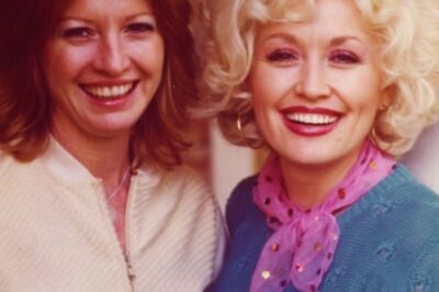 For over 60 years, Dolly Parton has trusted one woman with her most guarded secret—what she looks like without the wig. That woman is Judy Ogle, her childhood best friend turned lifelong confidante, who’s stood beside Dolly through every rhinestone-covered milestone. From sharing school lunches in Tennessee to escaping the spotlight during a personal crisis in 1986, their bond has remained unbreakable—and unseen by the public. Click to uncover the story behind Dolly’s most intimate friendship, the rumors it sparked, and why Ogle remains the only one allowed behind the legend’s curtain!