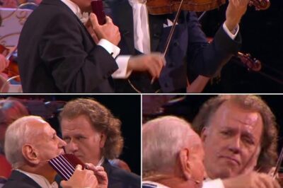 André Rieu’s violin sings with unmatched elegance, weaving seamlessly with the hauntingly beautiful notes of Gheorghe Zamfir’s pan flute. Their melodies float through the air like whispers from another world, enchanting the audience with every note. As the music swells, eyes glisten with emotion, breaths hitch in collective awe, and a wave of pure magic washes over the crowd. Time seems to stand still—this is not just a performance, but a moment of transcendence, where music touches the soul in its most breathtaking form.