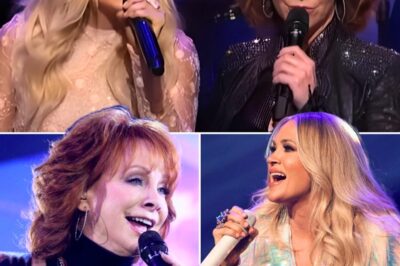 Reba McEntire Brings Carrie Underwood on Stage for an Unforgettable Moment as Their Voices Collide in a Powerful Duet of “Does He Love You,” Leaving the Crowd in Awe and Reba Beaming with Pride