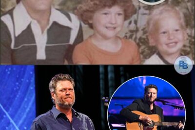 “I still hear you, Richie. Today would’ve been your birthday…” With those words, Blake Shelton walked out onto the Opry stage—no fanfare, no introduction, no plan to sing. He wasn’t there for the spotlight. He was there for his brother. Richie had been gone since Blake was just a teenager, taken too soon at 14, but in that moment, it was like he was right there again. The crowd went still, the air heavy with the weight of decades-old grief. Blake picked up his guitar and began “Over You”—the song he once called the one I wrote but couldn’t sing. His voice trembled, but he kept going, every note carrying the ache of a wound that never really heals. It wasn’t on the program, but it didn’t need to be. This wasn’t a performance. This was a conversation between two brothers—one on stage, one in memory—proving that some heartbreaks don’t disappear. They just wait for the right moment to speak.