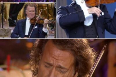 The First Eerie Notes of the Godfather Theme Twisted Through the Air Like a Whispered Secret as André Rieu Raised His Violin. Each Stroke of the Bow Carried the Weight of Love and Betrayal, the Melody Swelling With the Ghosts of a Story Too Powerful To Fade. The Orchestra Followed His Lead, Strings Weeping, Brass Murmuring, as if the Music Itself Held Untold Confessions. In That Mesmerizing Moment, Rieu Was No Longer Just a Musician—He Was a Storyteller, Spinning Cinema Into Sound.