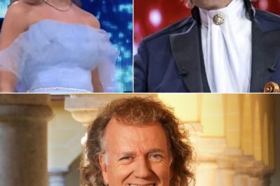 Under the Dazzling Lights of Mannheim, Emma Kok Took the Stage Beside André Rieu, Her Voice a Shimmering Thread of Pure Emotion. As the First Note Escaped Her Lips, Time Seemed to Hold Its Breath, the Orchestra Weaving a Breathtaking Tapestry Around Her. Every Lyric Carried an Unspoken Story, a Secret Longing That Gripped the Audience, Pulling Them Into Her World. And as the Final Note Faded Into the Night, the Silence Spoke Louder Than Words—Hearts Stolen, Souls Forever Enchanted.