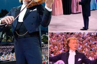 As the Moonlight Shimmers Across the Restless Waves, Casting a Silver Glow, Karolina Protsenko’s Bow Glides Across the Strings, Weaving a Melody That Whispers of Longing and Destiny. A Dream Waiting To Be Realized, a Story Hidden Beneath the Vast, Starry Sky, Is Contained in Every Note, Raw and Aching. As the Wind Holds Its Breath and the Ocean Listens, Time Itself Surrenders to the Music in This Brief Moment. Was It Only a Song, or Did It Offer a Look Inside Something Much Bigger? That Is the Question That Lingers as the Last Note Fades Into the Nightin the Moonlit Square of Maastricht, a Hush Falls as André Rieu Lifts His Bow.