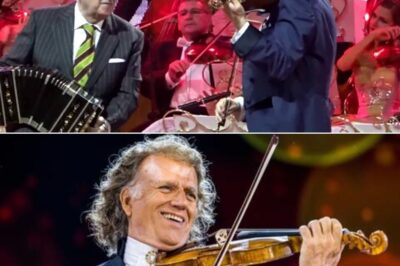 When André Rieu Lifts His Baton and the First Fiery Strains of “Libertango” Ignite the Air, It’s Not Just a Performance—It’s a Spellbinding Celebration of Rhythm, Grace, and Unfiltered Emotion. Piazzolla’s Iconic Composition Surges Through the Air, Reimagined With Rieu’s Signature Blend of Classical Sophistication and Theatrical Flair. The Orchestra Pulses With Precision, While Dancers Twist and Glide in a Whirlwind of Passion, Embodying the Soul of Tango.
