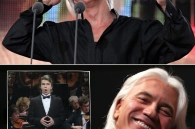 Dmitri Hvorostovsky stepped forward—his silver hair gleaming, his gaze serene. Then came “Ombra Mai Fù”, and time stood still. His velvet baritone unfolded like a whispered blessing from nature itself, wrapping the audience in waves of tenderness and sublime peace. No one dared to breathe; tears quietly traced the faces of those present. This wasn’t just music—it was a prayer, a lullaby for the soul. In that sacred moment, a legend was born—and classical music was changed forever.
