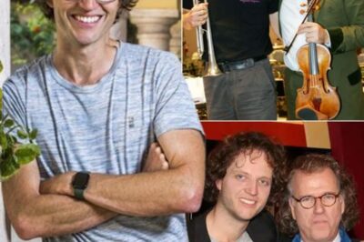 A Hauntingly Captivating Image of André Rieu and His Son Pierre Emerges From the Shadows, Igniting a Storm of Intrigue Under the Glow of a Chandelier-Lit Hall. The Legendary Violinist, His Bow Poised With Masterful Intent, Stands Beside Pierre, Whose Trumpet Hints at a Talent Yearning To Break Free, Their Shared Gaze Masking a Simmering Tension That Threatens To Shatter Their Musical Dynasty