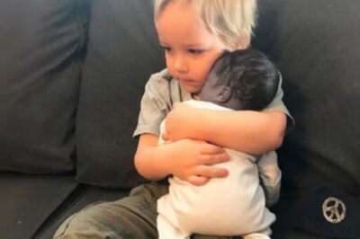 The stillborn baby was placed in his older brothers arms, seconds later, a cry echoes loudly!