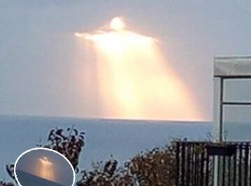 “Christ the Redeemer” Seen Radiating Light Through Clouds in Photo Taken by Man