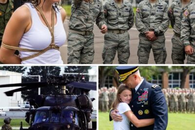 THE SERGEANT WAS HUMILIATING A YOUNG CADET, UNTIL A BLACK HELICOPTER LANDED AND… The noon sun scorched the training grounds at Fort Branson, turning the dirt field into a stage of cruelty. Sweat rolled down Cadet Julia Mercer’s face as she stood tied to a wooden post, her uniform stained with mud, her wrists raw from the coarse rope. Around her, the laughter of recruits and the sharp bark of Sergeant Cole Riker filled the air. “Look at this, people!” Riker shouted, pacing like a wolf with a smirk carved into his face. “Cadet Mercer here thinks she’s special. Thinks she can outlast real soldiers. Maybe a few hours in the sun will teach her some humility.” The other trainees shifted uncomfortably. No one dared to step in. Riker had a reputation — ruthless, untouchable. And Julia? She never talked back, never begged. That quiet defiance only fueled his rage. A phone camera clicked. Someone was filming. Riker loved an audience. “Smile for the camera, Mercer! Maybe your daddy will see what a disgrace his little girl’s become—” He never finished the sentence. A deep thunder rolled through the air — not from the clouds, but from the rotors slicing the sky. The wind whipped through the field as a black helicopter descended out of nowhere, its markings unrecognizable, its presence impossible to ignore. The laughter died instantly. Dust exploded across the ground, knocking Riker’s hat clean off. Every soldier on the field froze. This wasn’t a supply bird. This was military special ops transport, the kind used by only one kind of unit — the kind that didn’t answer to people like Riker. The side door slammed open. A man in dark tactical gear stepped out, moving with the authority of someone who’d seen more combat than anyone dared imagine. The insignia on his shoulder — classified black ops. He looked straight at Julia, then turned his glare to Riker. “Sergeant,” he said, voice cold enough to freeze the desert heat. “Untie my daughter.”…