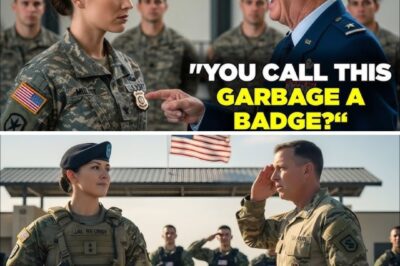 The General Laughed at Her “Fake Badge,” Until He Saw the Presidential Seal on It The war room at Fort Belvoir wasn’t used to uninvited guests. The air inside was thick with authority — brass polished to perfection, walls lined with maps, and a dozen generals arguing over classified strategy like they owned the country. And in the middle of it all stood a woman no one recognized. She wasn’t in uniform. No rank, no ribbons, no introduction. Just a black suit, a calm face, and a leather folder tucked under one arm. General Lawson, a man who’d spent thirty years barking orders across continents, slammed his hand on the table. “I don’t care who you are, ma’am — you don’t walk into a Joint Command briefing without clearance!” The woman didn’t flinch. “You’ll want to sit down for this, General.” He laughed — loud, mocking, the kind of laugh that made lieutenants shrink and aides disappear. “What are you, some kind of reporter? That badge looks like something out of a movie.” She sighed quietly, opened the folder, and placed an identification card on the polished oak table. For a moment, no one moved. The room’s overhead light glinted off the raised gold emblem — the Presidential Seal, embossed and unmistakable. The laughter stopped. General Lawson’s expression changed first — amusement collapsing into disbelief, then into something dangerously close to fear. He reached for the badge with trembling fingers, his voice suddenly low. “Where did you get this?” She met his gaze, steady and cold. “From the only person in this country who outranks you, General.” Silence fell. Even the hum of the fluorescent lights seemed to fade. Lawson swallowed hard. “Who the hell are you?” She leaned forward, her voice calm, deliberate — every word cutting through the tension like a blade…