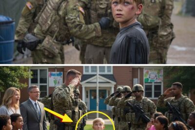 The Boy with a Bruised Eye Ran Into the Military Base and Pleaded, “Please… Be My Dad.” The Next Morning, a Navy SEAL Team Surrounded His School. They said heroes come home in flags. Eli Turner never got even that. At just eight years old, he had already learned two things about the world: how to take a hit — and how to stay quiet. Every morning at Jefferson Elementary, the same thing happened. “Hey, no-dad!” a bigger kid would shout across the playground. “Did your daddy run away from you too?” The laughter always came after. It wasn’t loud. That was the worst part. It was quiet — mean and practiced. Eli never fought back. He just picked up his torn backpack and walked away, one hand over his bruised eye. Once, he tried to tell his teacher. “Mrs. Duncan,” he’d whispered, “they keep calling me names.” The teacher didn’t even look up from her desk. “Eli,” she sighed, “maybe if you stopped telling stories about your ‘soldier dad,’ the other kids would leave you alone.” That word — stories — cut deeper than any punch. So he stopped talking altogether. Until that night. The rain came down hard over Fort Harrison — a government base on the edge of town. The guards at the gate saw him first: a small figure limping toward the lights, soaked to the bone, clutching a folded piece of paper. “Kid!” one shouted, running forward. “What are you doing out here?” Eli stumbled, dropped to his knees in the mud, and choked out the words that would change everything: “Please… be my dad.” The guard froze. The boy’s left eye was swollen. His hands trembled around a crumpled letter — worn, smudged, but still bearing a military seal and a familiar signature. Chief Logan Turner — United States Navy SEAL. Hours later, in the command office, Lieutenant Commander Jack Reynolds stared at that same letter in stunned silence. He’d served with Logan Turner — one of the bravest men he’d ever known — before the mission in Yemen took him away for good. Now, here was his son — bruised, alone, but standing straight like he’d been born for discipline. “Who gave you this letter, Eli?” Reynolds asked gently. “My mom,” the boy said softly. “Before she died last week. She said he was one of you.” Reynolds clenched his jaw. He turned the page over. On the back, written in Logan’s handwriting, were just seven words: “If I fall, my brothers stand for him.” The next morning, Jefferson Elementary didn’t sound like a school. It sounded like a military operation. Engines roared. Black SUVs lined the street. A hundred men in full uniform moved in perfect formation, boots splashing in puddles as teachers screamed and parents froze. Children pressed their faces to the windows as the convoy stopped at the front gate. From the lead vehicle stepped Lieutenant Commander Reynolds, his chest gleaming with medals, his jaw set like stone. “Principal Lewis?” he said calmly. “We’re here for Eli Turner.” The principal stammered. “W-what? Who—who are you?”…