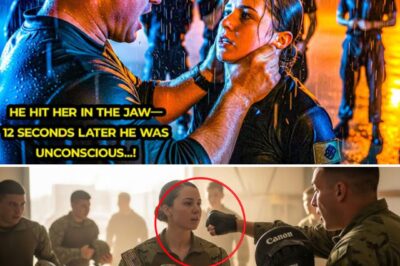 “The Lieutenant Hit Her During Training — He Never Expected What Happened Next”. “You don’t belong in a SEAL platoon, sweetheart. You’re just here to check a diversity box.” Lieutenant Bradley Harwick’s words came out like poison before his fist did. The impact cracked against Petty Officer First Class Raven Calderas’s jaw, snapping her head sideways in the middle of the close-quarters combat bay. Now, twenty seconds later, he was the one on the mat—unconscious—while the rest of the command stood frozen. No one understood how a 5’5″ woman had just dismantled their 6’3″ platoon commander in less time than it took to blink. Inside the medical tent, Raven pressed an ice pack to her jaw. Her teammates—quiet, uneasy—watched her. She didn’t cry. Didn’t flinch. She’d been through worse. At 29, Raven was one of the first women to complete the SEAL pipeline—an accomplishment so sensitive that her graduation had never been publicly released. On paper, she was a combat medic, diver-qualified, and a breacher. In practice, she was one of the most technically precise operators on the West Coast Teams. The bruise forming on her face wasn’t from enemy fire or a live exercise gone wrong. It was from her own commanding officer….