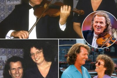 “Every note I play… is for her.” That’s how André Rieu describes his wife, Marjorie — not as a supporting character, but as his “eternal muse” — who SHAPES his musical soul. While the world knows him as a master of majestic waltzes and melodious concertos, André himself knows that without her quiet brilliance, none of it would have been possible. She never sought the limelight, but behind the scenes, Marjorie was everything: editor, adviser, savior, and the gentle voice that guided him through both the climax and the chaos. In every soaring violin line, her love resonates — not in the applause, but in the silence that only a muse can fill. Her love story is not sung, but played — note by note, from heart to heart.