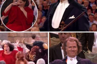 “When the Violin Roared Louder Than the Bull!” — André Rieu’s Whimsical ‘España Cañi’ Sends Pantomime Arena Into Musical Mayhem. Under the golden lights of a sold-out theatre, André Rieu’s bow danced across the strings—and so did the bull. As the maestro launched into his spirited take on “España Cañi,” something magical (and mildly unhinged) took hold: the pantomime bull began a dramatic, flamenco-infused rampage, swirling, stomping, and nearly stealing the spotlight. Laughter and astonishment swept through the crowd as Rieu kept playing, eyes twinkling, refusing to break tempo even as mock-matadors dove for cover. In that surreal, symphonic storm, music became mischief—and mischief became legend.