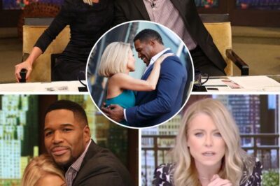 “SHOCKING BREAKING NEWS: Kelly Ripa Breaks Down Live With Devastating Cancer Revelation!” This morning, the live broadcast fell completely silent as Kelly Ripa, voice trembling, shared the words nobody expected: “I’ve been diagnosed with cancer… and I wanted you to hear it from me.” Michael Strahan immediately reached for her hand, eyes brimming with tears, while George Stephanopoulos looked down, visibly shaken. The normally lively atmosphere dissolved into an ocean of emotion as Kelly thanked viewers for their love, prayers, and strength. Fans at home flooded social media, posting heartbreak and support: “She’s carried us through so many mornings — now we’ll carry her.”