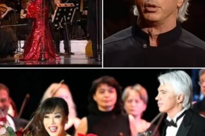 “When Beauty Met Farewell: Sumi Jo and Dmitri Hvorostovsky’s Last Duet” The lights dimmed slowly over the Vienna stage — that golden city where music breathes through marble and memory.