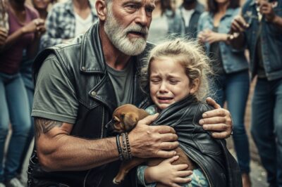The Old Biker Who Shielded a Little Girl and Her Shivering Dog — And Made an Entire Crowd Step Aside